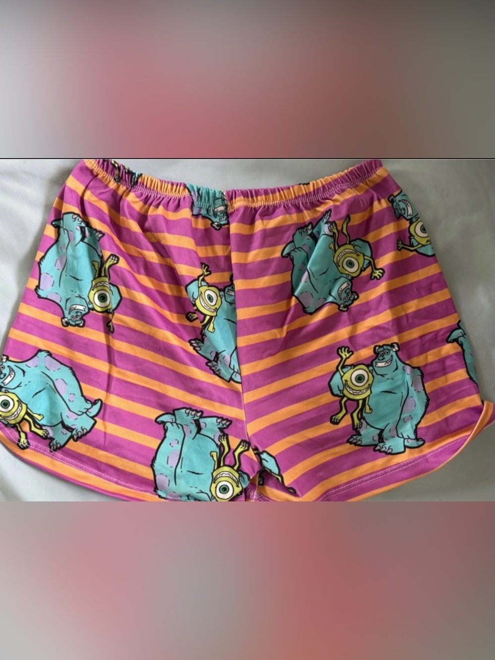 NWOT Woman’s monsters inc Pink & orange Striped Pajama Shorts with Monster Print